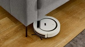 Ecksofa COMFORT SMART aus Stoff in Hellgrau COMFORT SMART Anuk - Ecksofa hellgrauer Bezug Simply Clean – Stellfläche ca. 241 x 166 cm