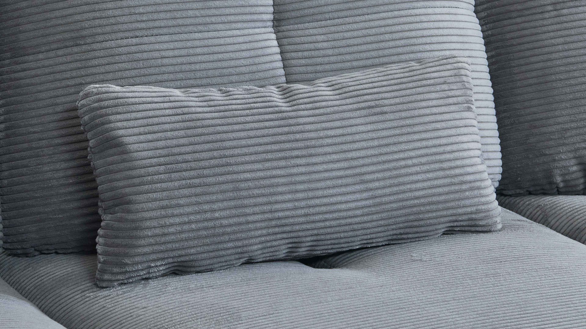 Ecksofa KAWOO aus Stoff in Grau KAWOO Polsterprogramm Dover XC - Ecksofa grauer Cordbezug - Stellfläche ca. 301 x 191 cm