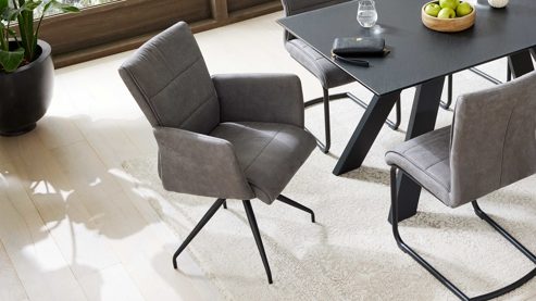 Tischgruppe Interliving aus Glas in Schwarz Interliving Esszimmer Serie 5122 – Essgruppen mit Schwingstühlen schwarzes Glas & Metall - ca. 160 x 90 cm